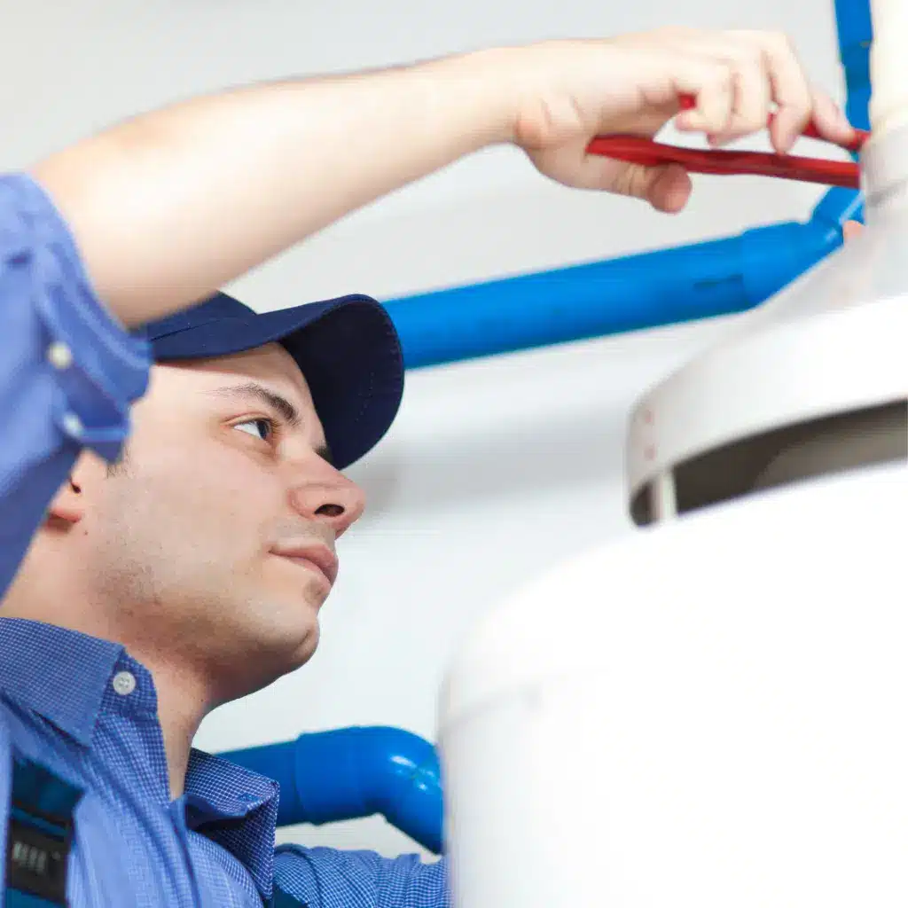 Water heater repair in Cuyahoga Falls. Tech servicing water heater