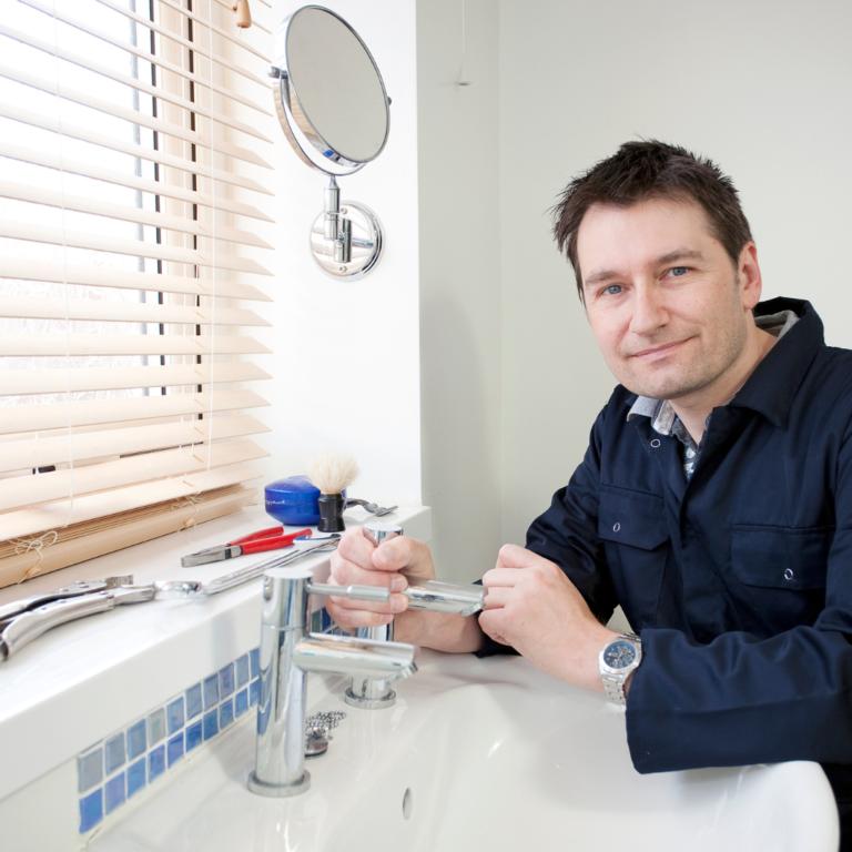 Plumber in Belle Vista fixing sink